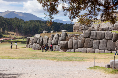 Cusco, Peru - May 14 : People walking and admiring the beauty and mystery of the ancient site of Saqsaywaman in Peru. May 14 2016, Cusco Peru.のeditorial素材