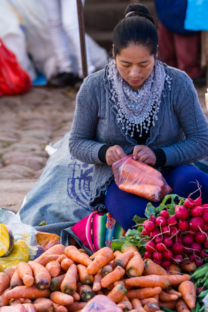 Pisac, Peru - May 15: Fresh produce for sale by native Quechua people at the Pisac Market. May 15 2016, Pisac Peru.のeditorial素材