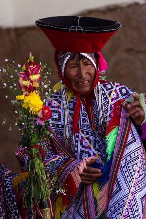 Pisac, Peru - May 15: Quechua elders in traditional clothing in a small ceremony in the Pisac Market. May 15 2016, Pisac Peru.のeditorial素材