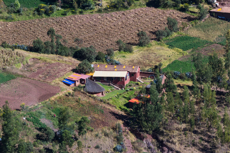 Cusco, Peru - May 15: Small farmhouses views from a distance in the Sacred Valley of the incas, a lifestyle photograph. May 15 2016, Cusco Peru.のeditorial素材