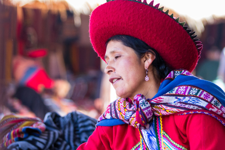 Chinchero Peru -May 18 : Lifestyle photograph of woman in chinchero selling products at the market. May 18 2016, Chinchero Peru.のeditorial素材