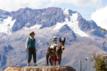 Maras Peru -May 18 : Statue in the downtown square of the city of Maras representing the lifestyle...