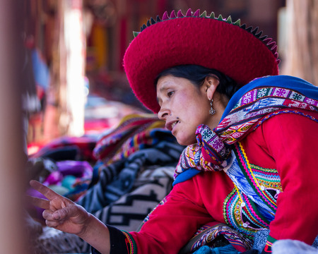 Chinchero Peru -May 18 : Lifestyle photograph of woman in chinchero selling products at the market. May 18 2016, Chinchero Peru.のeditorial素材