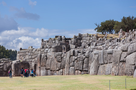 Cusco, Peru - May 14 : People walking and admiring the beauty and mystery of the ancient site of Saqsaywaman in Peru. May 14 2016, Cusco Peru.のeditorial素材