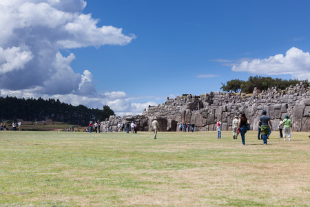 Cusco, Peru - May 14 : People walking and admiring the beauty and mystery of the ancient site of Saqsaywaman in Peru. May 14 2016, Cusco Peru.のeditorial素材