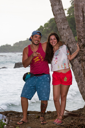 Uvita, Costa Rica - May 04: young Costa Rican couple (brother and sister) posing with the pacific in the background. May 04 2016 Uvita, Costa Rica.のeditorial素材