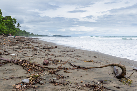 Uvita, Costa Rica - May 04: Beach scene in the south pacific of Costa Rica with couples and families enjoying the warm water. May 04 2016 Uvita, Costa Rica.のeditorial素材
