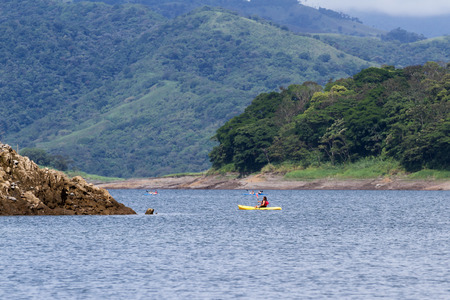 San Carlos, Costa Rica - May 27 : tourists touring Arenal lake in kayaks. May 27 2016, San Carlos, Costa Rica.のeditorial素材