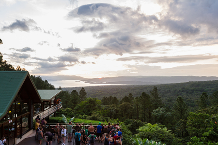 San Carlos, Costa Rica - May 25 : tourists and guides enjoying the sunset from the Observatory Lodge. May 25 2016, San Carlos, Costa Rica.のeditorial素材