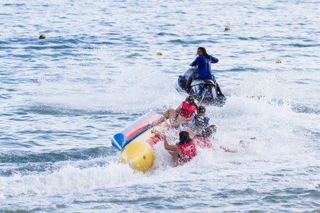 Santa Clara, Panama- June 10: tourists enjoying a thrill ride being pulled by a wave runner on the...