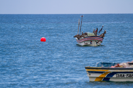 Santa Clara, Panama- June 12: Brown pelicans perched on a small fishing boat. June 12 2016, Santa Clara, Panama.のeditorial素材