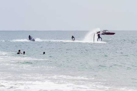 Santa Clara, Panama- June 12: Local people enjoying a thrilling experience on a flyboard in the...