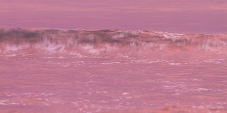 sunset glow used for lighting with a slow shutter speed on moving waves in the pacific coast of Costa Ricaの写真素材