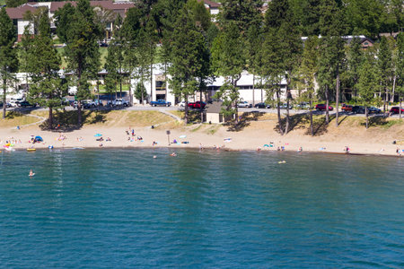 Coeur d' Alene, Idaho - August 12: Aerial view of the beach with families enjoying the sunshine and lake. August 12 2016, Coeur d' Alene, Idaho.のeditorial素材