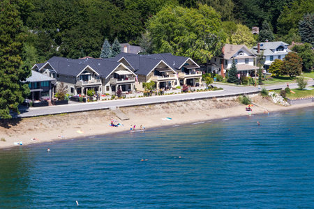 Coeur d' Alene, Idaho - August 12: Aerial view of the beach with families enjoying the sunshine and lake. August 12 2016, Coeur d' Alene, Idaho.のeditorial素材