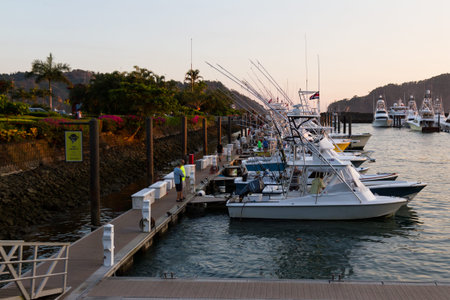Herradura, Costa Rica - February 25: Beautiful fishing boats docked at Los Suenos Marina. Herradura, Costa Rica - February 25のeditorial素材