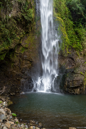 beautiful pristine waterfall in the rainforest of Costa Ricaのeditorial素材