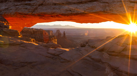 Mesa Arch is a very popular destination specially for sunrise when  the rock glows red as the sun...
