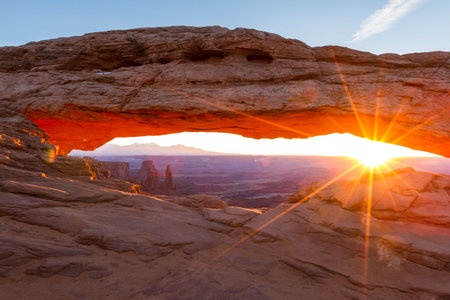 Mesa Arch is a very popular destination specially for sunrise when  the rock glows red as the sun...