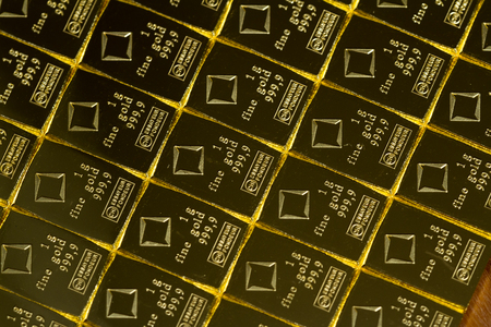 Medford, Oregon - November 04: Close up of a Valcambi gold bar perforated into breakable 1 oz pieces of gold. November 04, Medford, Oregon.のeditorial素材