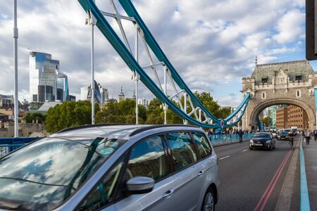 London  - September 05 2019: Heavy traffic on the Tower Bridge with pedestrians, cyclists and vehicles traveling across the Thames, London September 05,  2019のeditorial素材