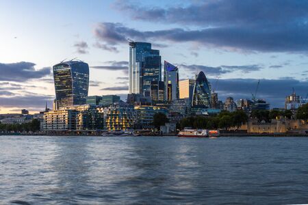 London  - September 05 2019: Evening view of the buildings on the London financial district form across the Tames, London September 05,  2019のeditorial素材
