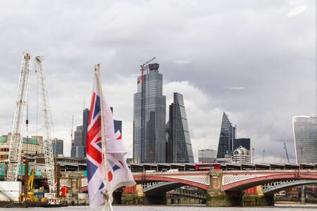 London  - September 06 2019: Construction cranes busy at work erecting tall buildings around the city, London September 06,  2019のeditorial素材