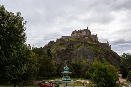 Edinburgh Scotland  - September 13 2019: Ross Fountain with Edinburgh Castle in the background from the Princess Street Garden in the city of Edinburgh, UK September 13,  2019のeditorial素材