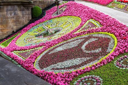 Edinburgh Scotland  - September 13 2019: Floral Clock celebrating 100 years of save the children in the Princess Street Garden, Edinburgh UK September 13,  2019のeditorial素材