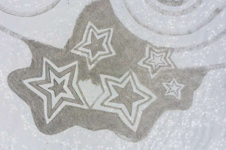 Bandon by the Sea, Oregon / USA - March 08 2020: Detailed artwork created by the team of Circles in the Sand on the beach of Face Rock State Parkのeditorial素材