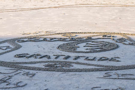 Bandon by the Sea, Oregon / USA - February 20 2020: Artwork created by the team of Circles in the Sand on the beach of Face Rock State Parkのeditorial素材