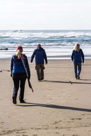 Bandon by the Sea, Oregon / USA - February 21 2020: Denny Dike and the team of Circles in the Sand drawing a walkable labyrinth in the flat sandy beach of Face Rock State Parkのeditorial素材