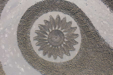 Bandon by the Sea, Oregon / USA - March 07 2020: Artwork created by the team of Circles in the Sand on the beach of Face Rock State Parkのeditorial素材