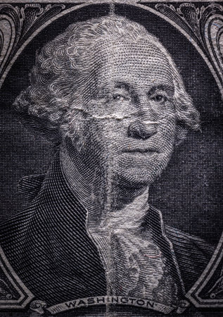 Macro image of a one dollar bill as a conept