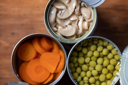 Close up of cans of food as a concept for National Canned Food Day.の写真素材
