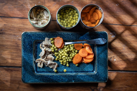 Servings of canned vegetables on a plate.の写真素材