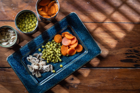 Servings of canned vegetables on a plate.の写真素材