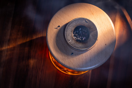 Aromatic smoke added to the top of an Old Fashioned Cocktail
