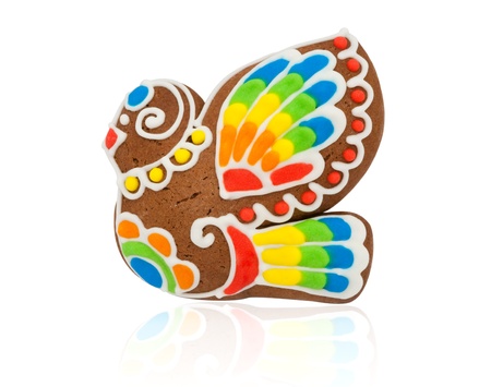 Gingerbread in the form of a bird on a white backgroundの写真素材