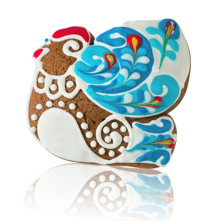 Gingerbread in the form of a bird on white backgroundの写真素材