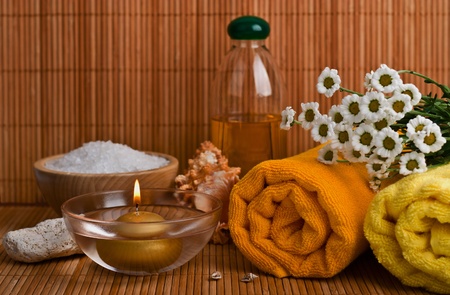 Spa style Towel with Bamboo, bowl of sea salt and candle の写真素材