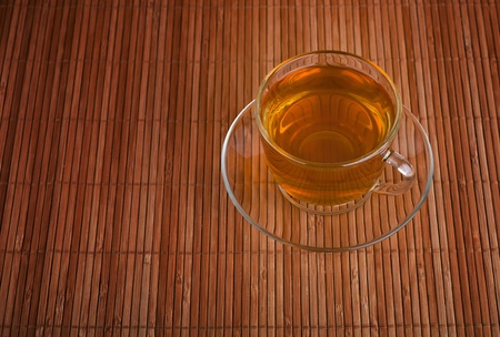 cup of tea on a bamboo napkinの写真素材
