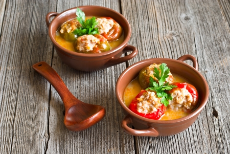 Stuffed peppers on rustic wooden tableの写真素材