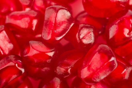 Background of ripe grains pomegranate macroの写真素材