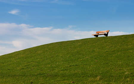Bench with view from the dikeの写真素材