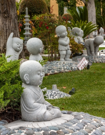 HACIENDA HEIGHTS, CA/USA - April 23: Carefully manicured gardens and statues grace Hsi Lai Temple, the largest traditional Chinese Buddhist monastery in the United States. April 23, 2011.の写真素材