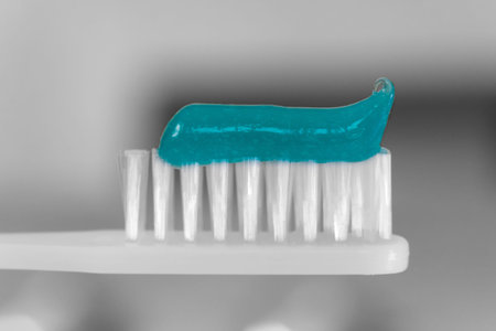 White Toothbrush with Tooth Paste Macro