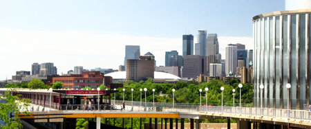 MINNEAPOLIS/USA - July 23: Downtown Minneapolis skyline from the campus of the University of Minnesota.  The University of Minnesota is a university in Minneapolis and St. Paul, MN and the 6th largest univerity in the USA. July 23, 2012.のeditorial素材
