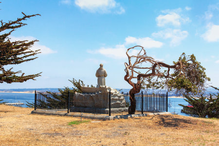 MONTEREY, CA/USA - July 30: Mmonument of Spanish friar Junipero Serra overlooks Monterey Bay at the Presidio of Monterey. The monument is at the location where Serra landed in 1770 and founded the Mission San Carlos, Monterey. July 30, 2013のeditorial素材