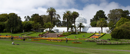 SAN FRANCISCO/USA - AUGUST 10: Historic Conservatory of Flowers is a greenhouse and botanical garden that houses a collection of rare and exotic plants in Golden Gate Park, San Francisco, California.  August 10, 2013.のeditorial素材